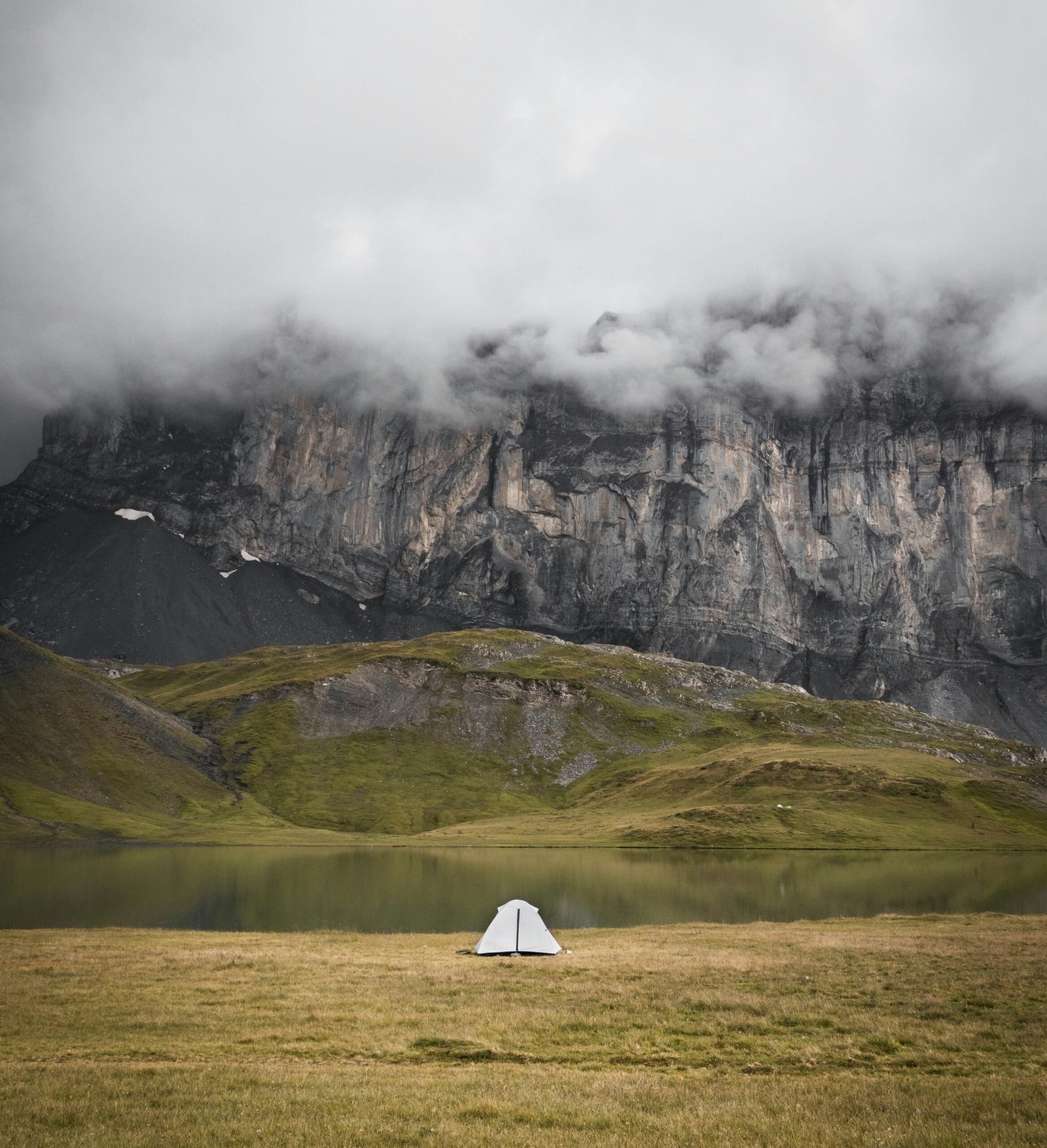 a camping tent in nature in a cloudy weather